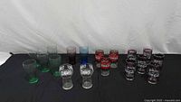 Group shot showing all 18 glasses sorted by type and colour