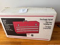 Closed shipping box showing illustration, branding and features