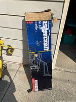 Front of boxed Mastercraft bicycle lift showing branding and product image