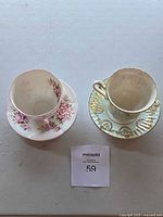 Top view showing both teacup-saucer sets side by side