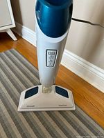 Close-up of mop head with logo and powerfresh label