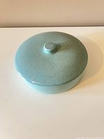 Top view of blue speckled casserole with lid