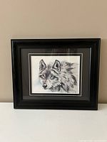 Front view showing entire framed wolf watercolor print