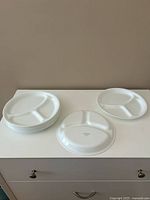 Stack and single view of the white Corelle sectioned plates