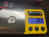 Digital scale showing ring weight 1.62 g