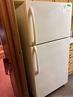 Full view of white Frigidaire two-door refrigerator