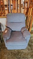 Front view of grey motorized recliner