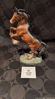 Full view of Beswick model 1014 rearing horse figurine on base with MaxSold ID card