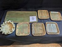 Full set of eight Martha Jack pottery pieces displayed