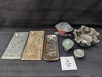 All eight pottery pieces laid out: three trays, two bowls, two mushrooms