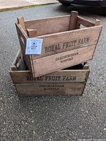 two stacked Royal Fruit Farm wooden crates showing stencilled sides