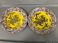 Front view of both dragon motif plates
