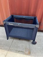 Overall view of Cosco Funsport playard, standing assembled