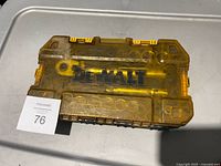 Closed transparent yellow DEWALT case top view