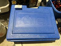 Closed blue K'NEX carry case showing logo and exterior condition
