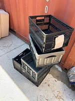 stacked view of four unfolded crates