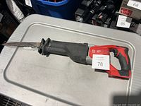 Full view of Milwaukee M18 reciprocating saw on table