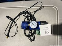 Top view showing gauge, hose, power cord and plug