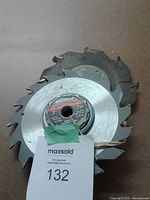 Two 7-inch adjustable wobble dado blades showing teeth, adjustment hub and label