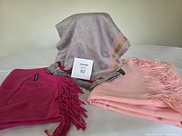 All three scarves grouped to show colours and styles