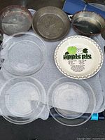 Group shot of all eight pie and cake pans
