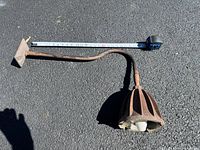 Full view of Pyle cast-iron light with tape measure showing 27 in length