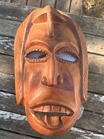 Front view of carved wooden mask