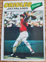 Front of 1977 Topps Jim Palmer baseball card showing image, text, and signature.
