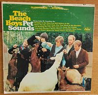 Front cover of Pet Sounds LP showing title, Capitol logo, duophonic stereo marking, band with goats