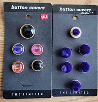 Two retail cards labelled The Limited button covers showing mixed colour faceted glass set and purple velvet set