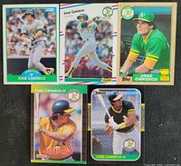 Front view of all five Jose Canseco baseball cards