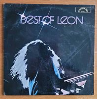 Front album cover with title "Best of Leon" and performance silhouette