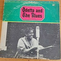 Front sleeve showing album title, artist photo and wear