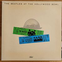 Front cover showing title, ticket graphics, Capitol logo