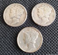 Obverse of three Mercury dimes showing dates 1936, 1939, 1944