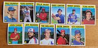 Front view of all 11 Topps 1986 NL All-Star cards laid out in two rows