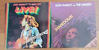 Front covers of both Bob Marley vinyl albums