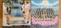 Front album covers of George Harrison’s Thirty Three & 1⁄3 and Dark Horse LPs