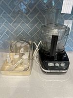 Food processor and accessory case side by side
