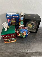 Group shot showing all five ornaments and boxes