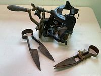 Overall view of sharpener and two shears