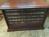 Front view of six-drawer Richardson spool silk cabinet