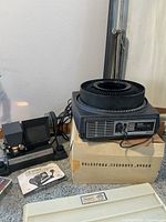 Projector, editor, slide tray on box