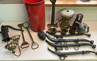 overview of assorted metal items on table