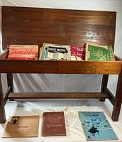 bench open showing internal storage and music books