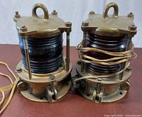 Both brass navigation lamps showing overall design and wiring