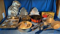 Overall group shot showing major bakeware pieces and utensils