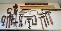 Full layout of all vintage hand tools on table