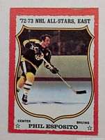 Front view of Phil Esposito O-Pee-Chee card showing image, border and text