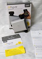 Front of box and timer unit with manuals visible